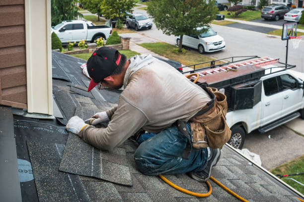 Professional Roofing technician working in Jericho, VT
